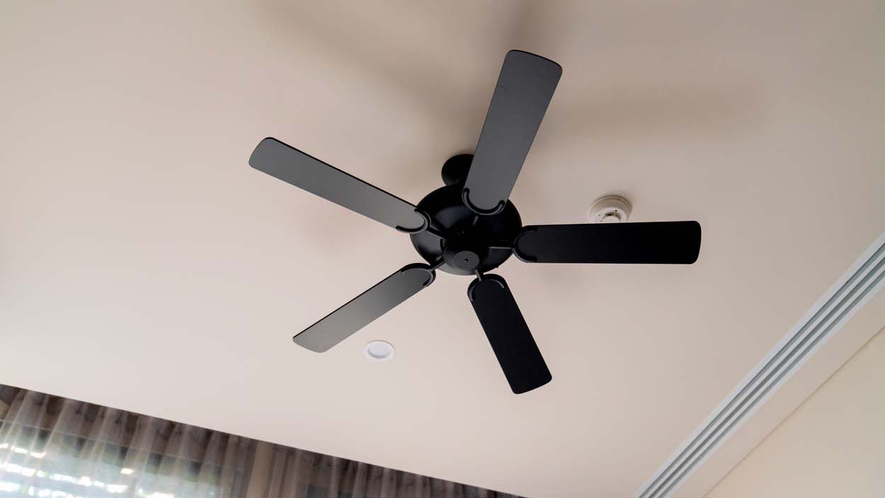 Moving ceiling fan in a hotel room,indoor hanging decorate ceiling fan install in bedroom hotel interior design